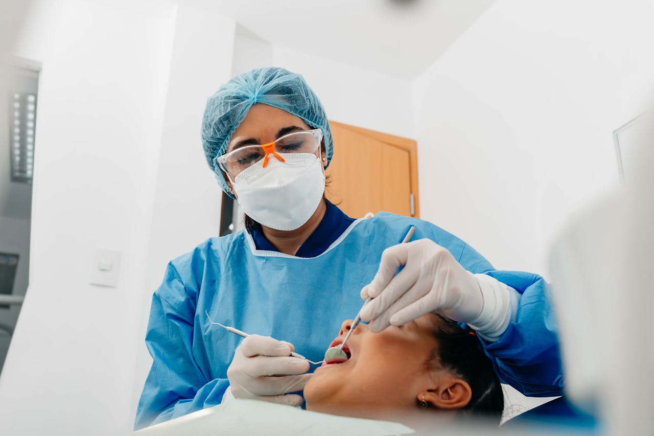 child sitting with dentist